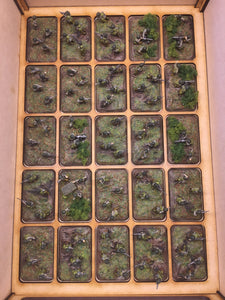 Miniature storage tray insert with flames of war medium base sized cut outs